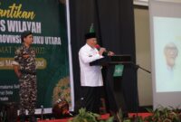 Gubernur Maluku Utara, KH. Abdul Ghani Kasuba saat memberikan sambutan pada kegiatan pelantikan pengurus NU. 