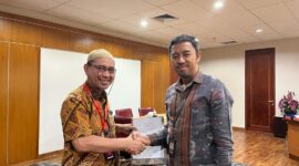 Kadis Diskominfosan Malut Iksan RA Arsyad dan Kepala Perwakilan BI Malut, R. Eko Adi Irianto. 
