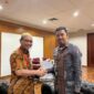Kadis Diskominfosan Malut Iksan RA Arsyad dan Kepala Perwakilan BI Malut, R. Eko Adi Irianto. 