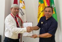 Kepala Dinas Kominfosan Malut, DR. Iksan RA Arsyad dan Ketua STIMIK Tidore Mandiri, Muh. Sofyan do Musa, SE. M,Si.