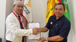 Kepala Dinas Kominfosan Malut, DR. Iksan RA Arsyad dan Ketua STIMIK Tidore Mandiri, Muh. Sofyan do Musa, SE. M,Si.