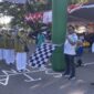 Sekprov Malut Drs Samsudin A. Kadir saat melepas lomba gerak jalan dan tarian poco - poco dalam rangka HUT Malut ke 24.