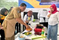 Plt Kadis Perkim Malut, Abdul Kadir Usman mengikuti lomba bakar ikan antar OPD