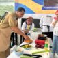 Plt Kadis Perkim Malut, Abdul Kadir Usman mengikuti lomba bakar ikan antar OPD