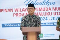 Pj Sekda memberikan sambutan pada acara pelantiakan pengurus wilayah PP Muhammadiyah Maluku Utara.