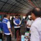 Pj Gubernur Malut saat turun langsung menemui korban erupsi Gunung Ibu. 