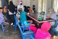 Pemeriksaan kesehatan gratis di Desa Malbufa usai peristiwa bencana alam air pasang yang melanda desa tersebut. 