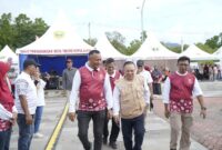 Wali Kota Tidore Kepulauan, Muhammad Senen mendampingi Deputi Bidang Keluarga Sejahtera dan Pemberdayaan Keluarga BKKBN RI, Nopian Andusti dalam rangka Harganas tahun 2025 di Kota Tidore. 