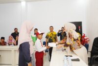 Kepala Dinas Pendidikan Kabupaten Kepulauan Sula, Marini Nurali, dalam acara pelepasan MuZulfahri Mado Ebarian.