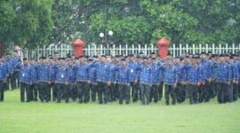 Ratusan ASN Pemkot Tidore mengikuti upacara HUT KORPRI meski diguyur hujan. 