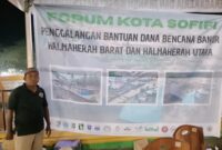 Sidin Usman saat di posko penggalangan dana. 