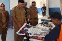 Wagub Malut Sarbin Sehe didampingi Asisten Bidang Perekonomian dan Pembangunan Setda Provinsi Maluku Utara, Sri Haryati Hatari pantau kegiatan MTQ XXXI di Sofifi