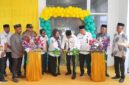 Potong pita peresmian gedung baru Unit Pelayanan Terpadu (UPT) Pusat Kesehatan Masyarakat (Puskesmas) Kabau,